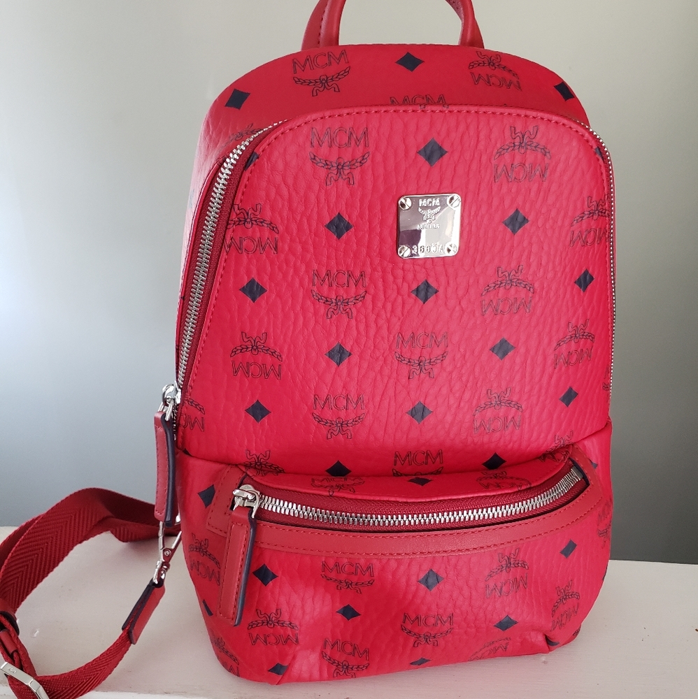 MCM Klassik Visetos Sling Back Bag New never used. Was a gift.